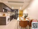 Modern kitchen with dining area including appliances and wooden dining table