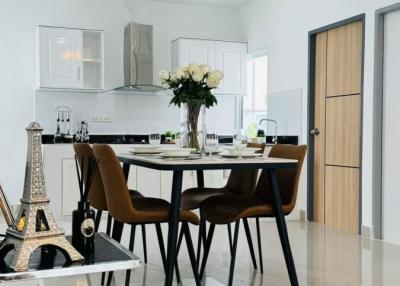 Modern kitchen with dining area and decorative elements