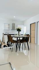 Modern kitchen with dining area and decorative elements
