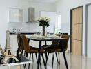 Modern kitchen with dining area and decorative elements