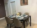 Elegantly set dining table in a modern room with artwork