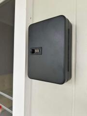A wall-mounted security keypad