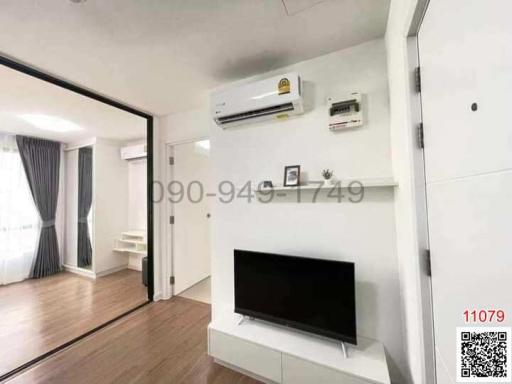 Modern living room interior with television and air conditioning units