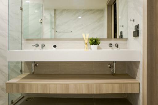 Modern bathroom with floating vanity and spacious countertop