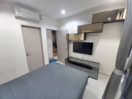 Cozy bedroom with modern furnishings and en-suite bathroom