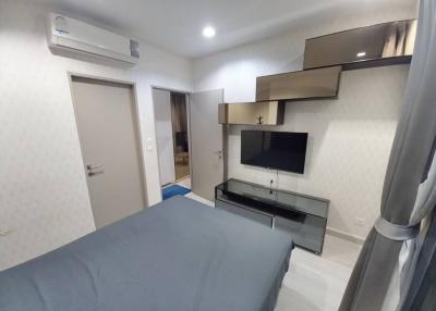 Cozy bedroom with modern furnishings and en-suite bathroom