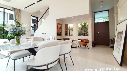 Spacious living room with dining area and view of the garden