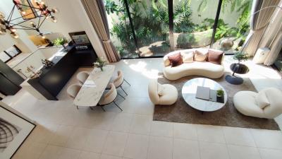 Spacious and modern living room with natural lighting