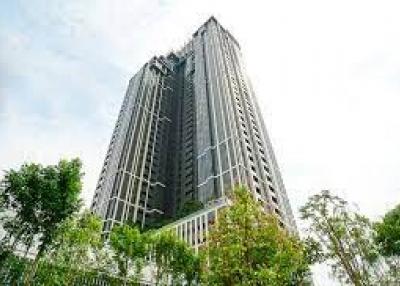 Modern high-rise residential building against a clear sky