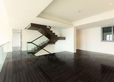 Modern airy building interior with a stylish staircase