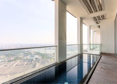 Spacious balcony with a private pool and a panoramic city view