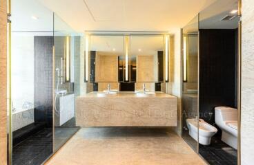 Modern bathroom interior with double vanity sinks and large mirrors