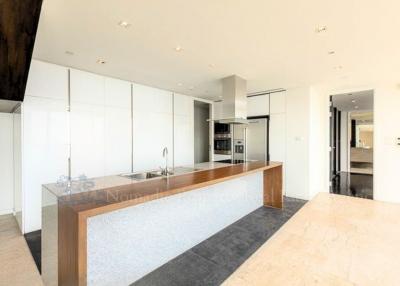 Modern kitchen with open layout and integrated appliances