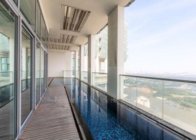 Spacious balcony with glass railing and a beautiful view