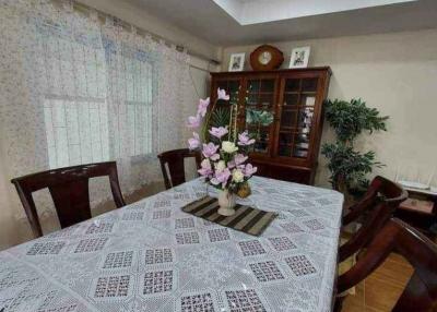 Elegant dining room with a large table and chandelier