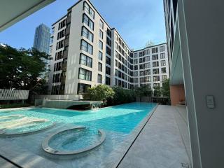 Apartment building with outdoor swimming pool and modern façade