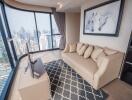 Modern living room with cityscape view through large windows