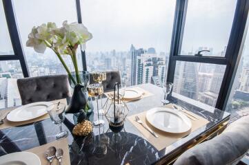 Elegant dining room with panoramic city views