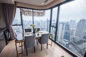 Modern dining area with skyline view