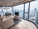 Modern living room with floor-to-ceiling windows overlooking the city