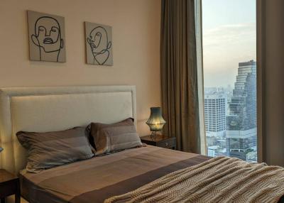Cozy bedroom with city view and modern decor
