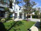 Modern house exterior with landscaped garden