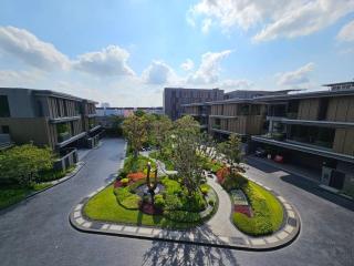 Modern residential complex with a beautifully landscaped courtyard