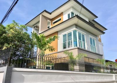 Modern two-story house with a clear blue sky