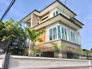 Modern two-story house with a clear blue sky