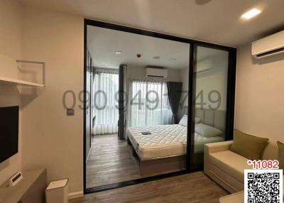 Modern bedroom with large mirror sliding closet doors