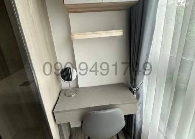 Compact modern bedroom workspace with desk and chair