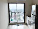 Compact balcony with city view and sliding doors