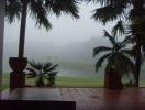 Scenic view from outdoor patio overlooking misty landscape