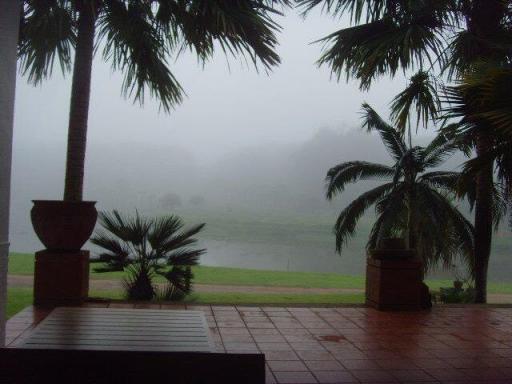 Scenic view from outdoor patio overlooking misty landscape