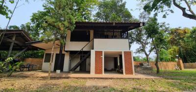 Modern two-story building with outdoor surroundings