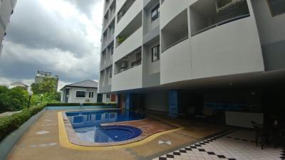 Exterior view of the apartment building with swimming pool