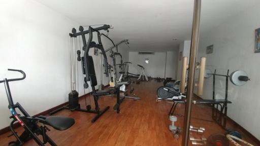 Spacious Home Gym with Various Exercise Equipment