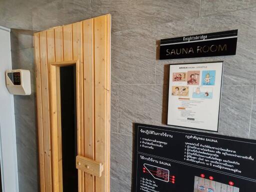 Sauna Room with Wooden Door and Control Panel