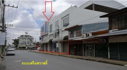 Showroom building next to Sermsawat Road.