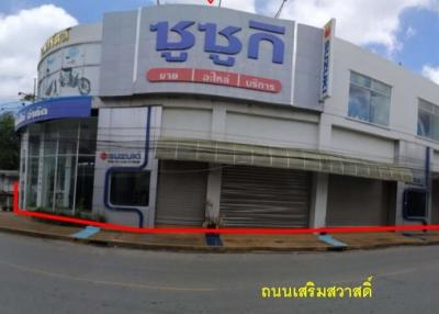 Showroom building next to Sermsawat Road.