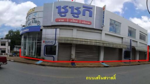 Showroom building next to Sermsawat Road.