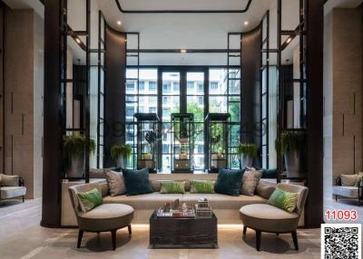 Elegant modern lobby with comfortable seating and expansive windows