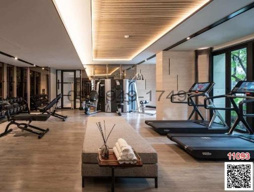 Modern home gym with treadmills and weight training equipment