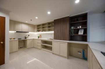 Modern kitchen with ample counter space and built-in shelves