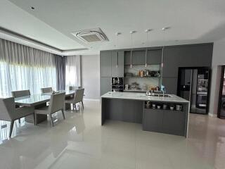 Modern kitchen with integrated dining area