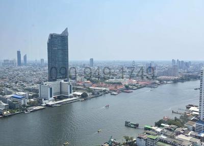 Panoramic city and river view from high-rise apartment