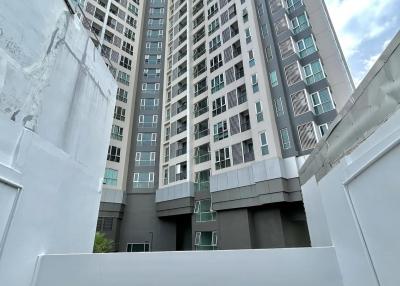 Exterior view of a high-rise residential building