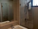 Modern bathroom with glass shower and stylish basin