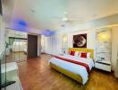 Spacious and well-lit bedroom with modern furnishings and en-suite bathroom