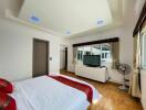 Spacious bedroom with modern amenities and ample natural light